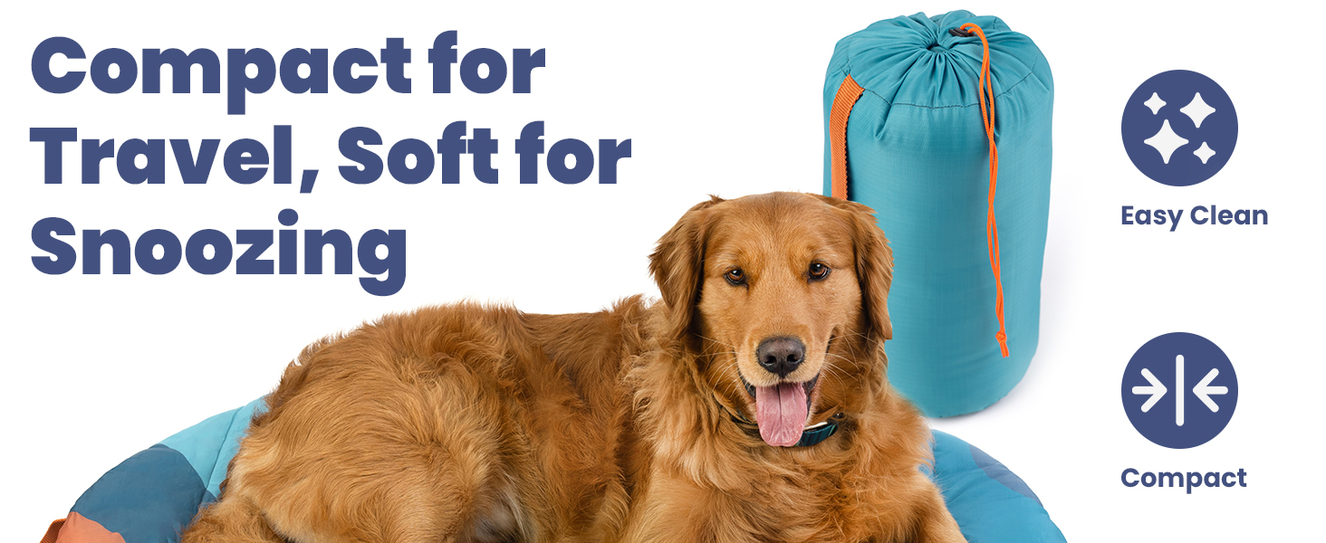 Golden retriever lying on cushioned dog camping bed next to rolled-up, ultra-durable travel bag